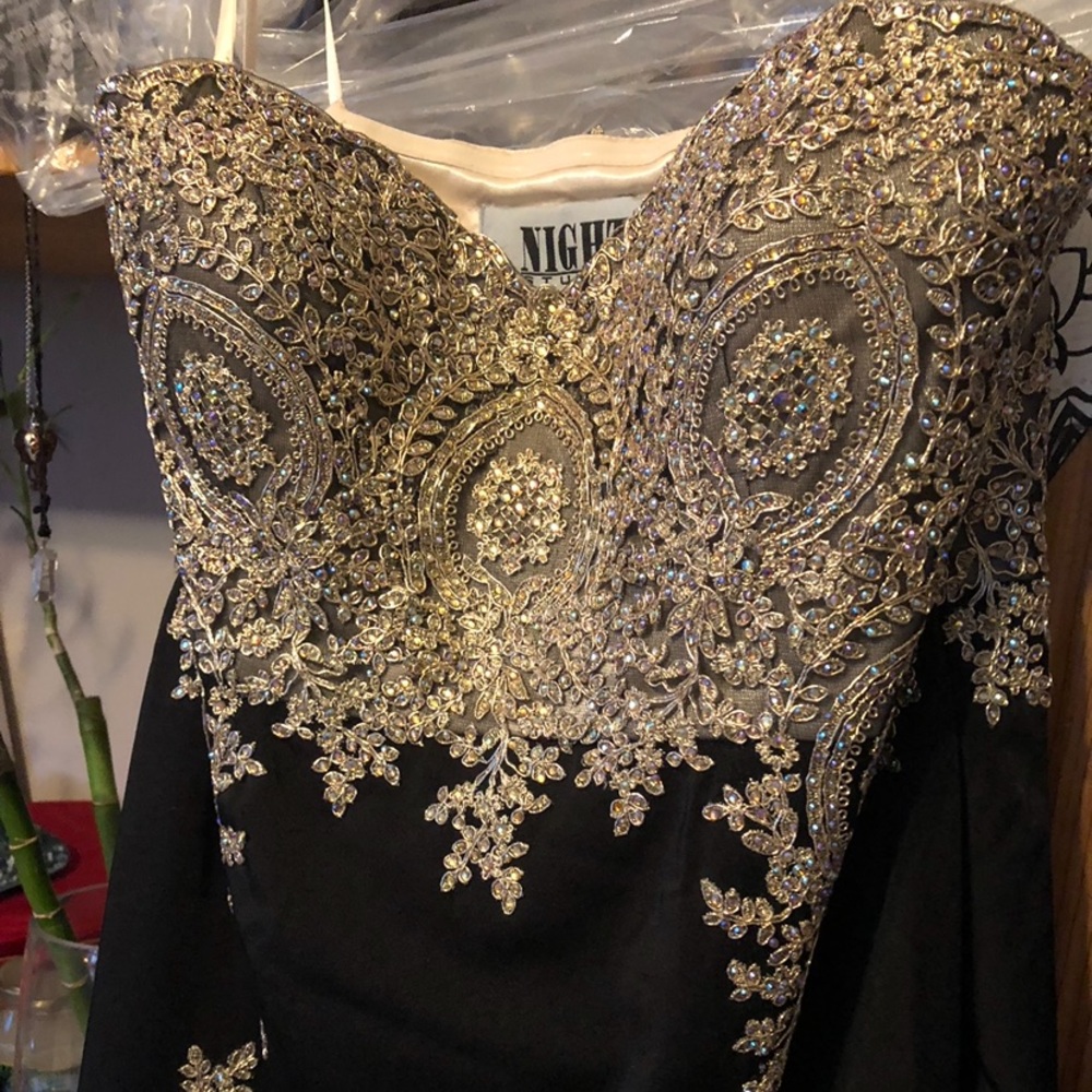 Black gown with gold beaded and lace detail